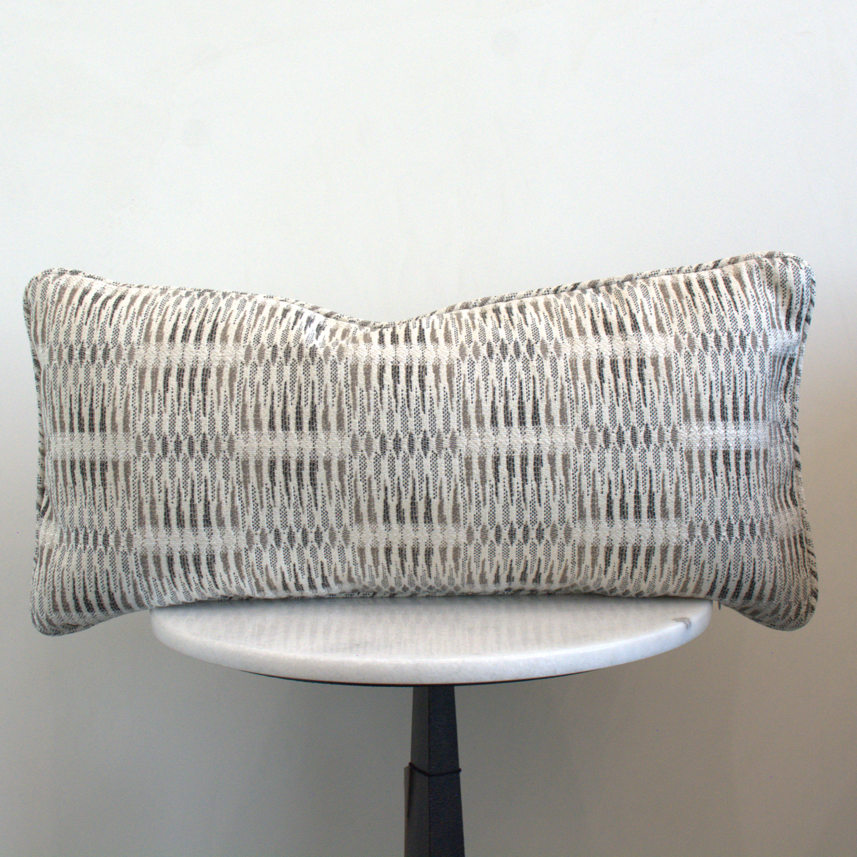 Allan Pillow in ebony color, made from a cotton, viscose, and linen blend, curated by DA Atelier.