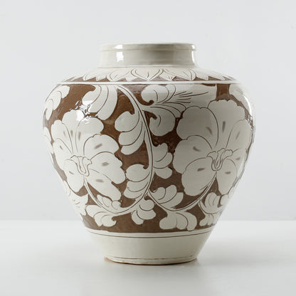 Amalfi Vase with glazed creme surface and terracotta flower pattern, tapered design by DA Atelier.