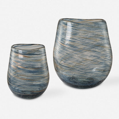 Aurora Swirl Vase from DA Atelier’s Bozeman, Montana collection, showcasing a captivating blue and gold swirled pattern on clear bubble glass.